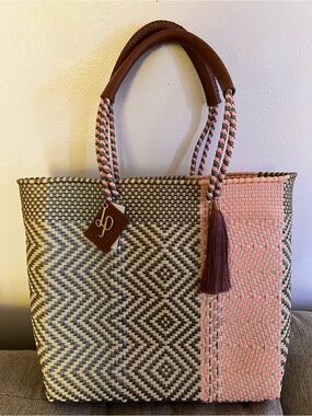 Woven Two-Tone Tote with Pink Tassel Accent